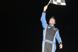 Ricky Cornwall celebrates his Street Stocks win. Photo by Geoff Rounds