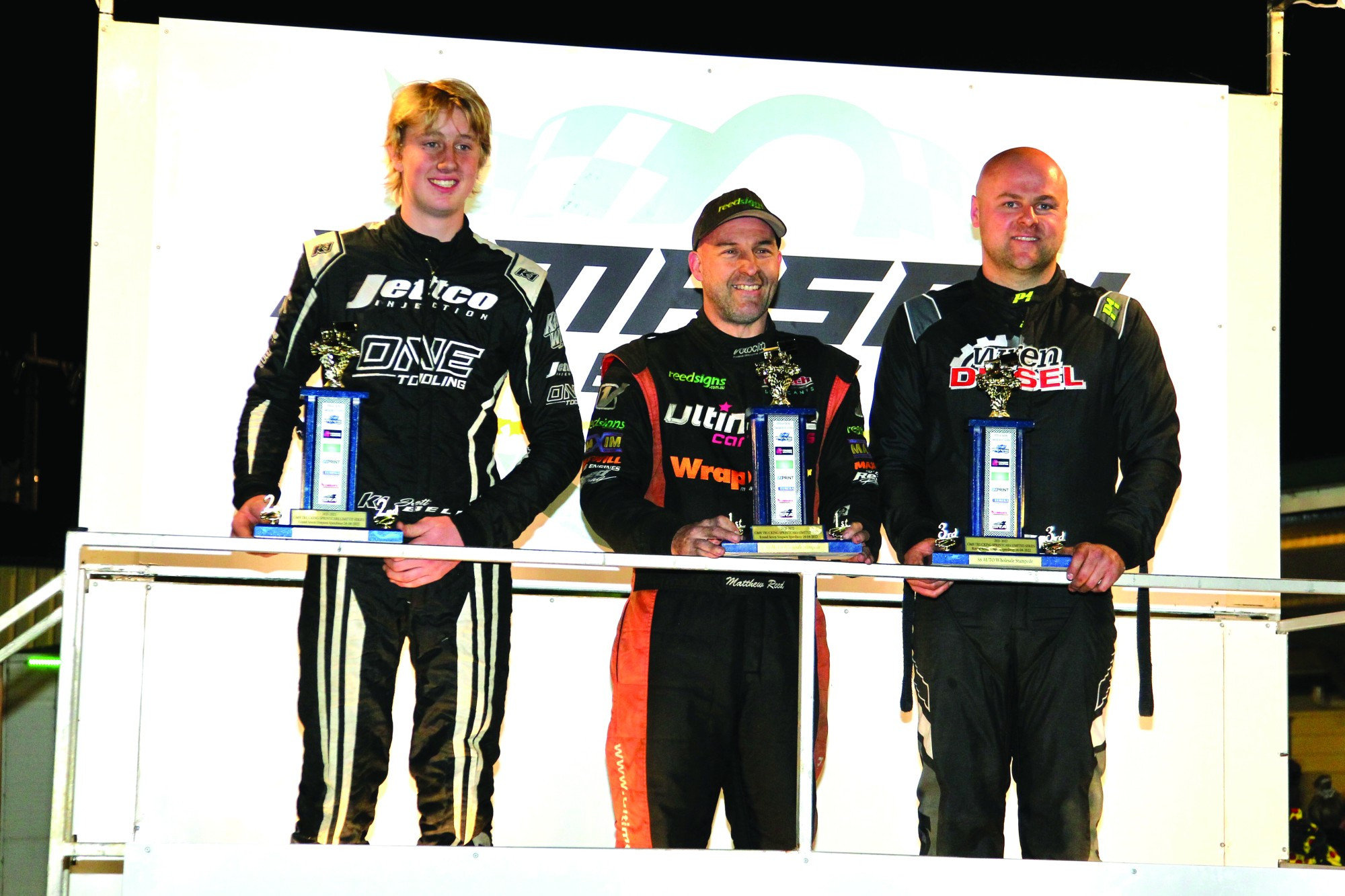 Matthew Reed (centre) won Saturday night’s sprintcar finale ahead of Jett Bell (left) and Sam Wren (right), with Wren taking out the series. Photo by Geoff Rounds.