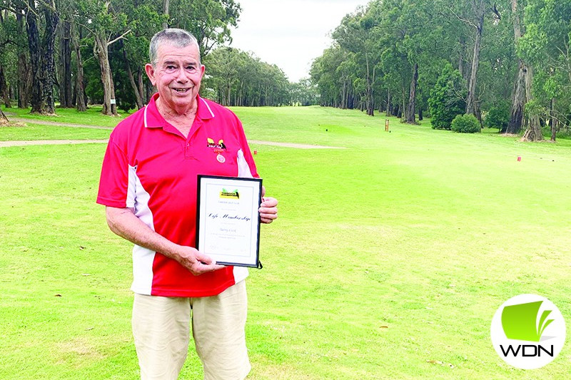 Barry Cook with the Timboon Golf Club life membership award he received last weekend.