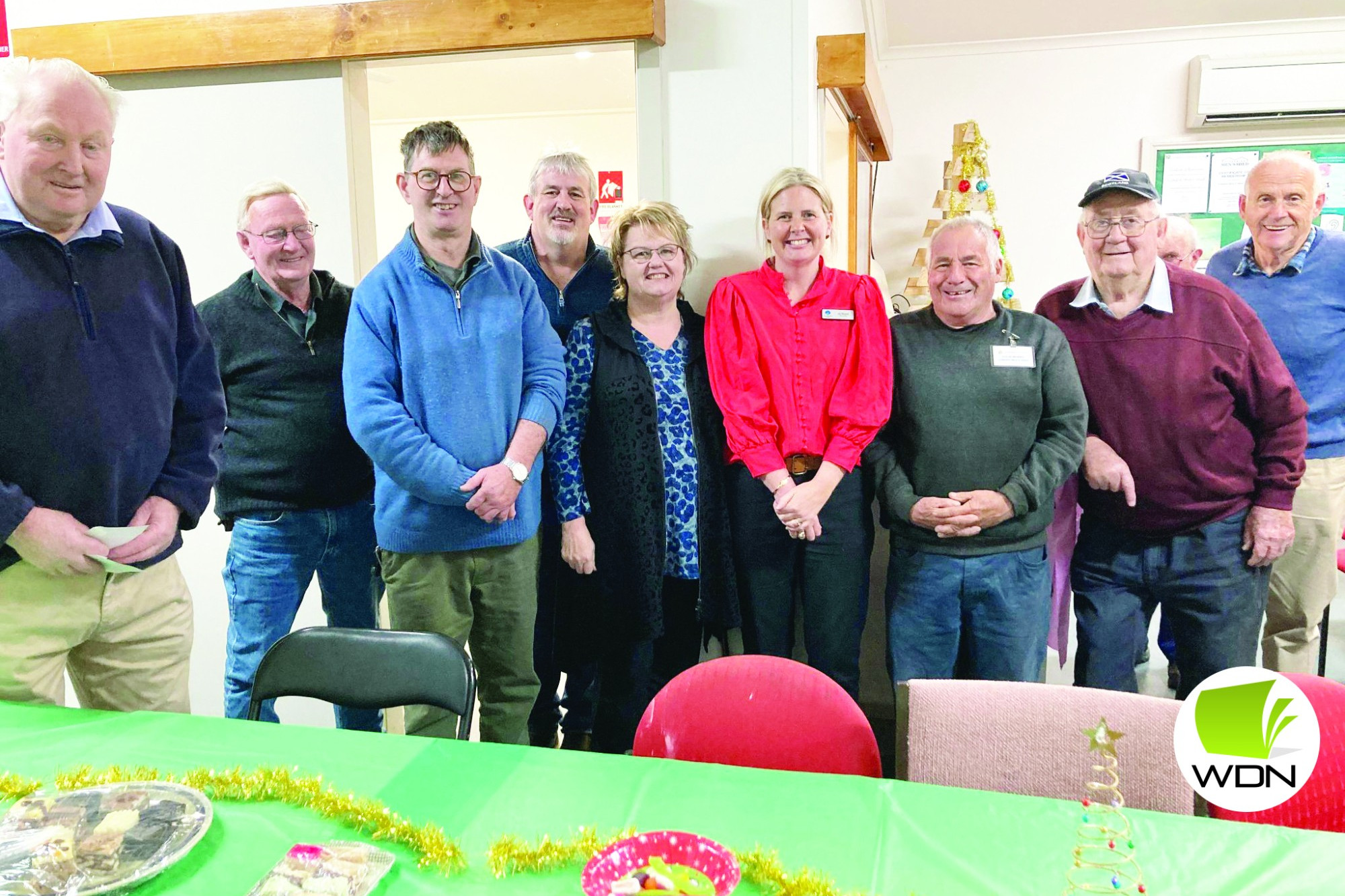 Christmas spirit: Cobden Men’s Shed members with Kathryn and Andrew Stubbings and Corangamite Shire Cr Jo Beard.