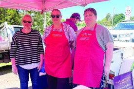 Community Bank staff put on a barbecue. 