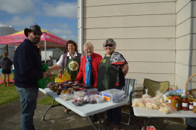 Locals and visitors alike made the most of market stalls. 