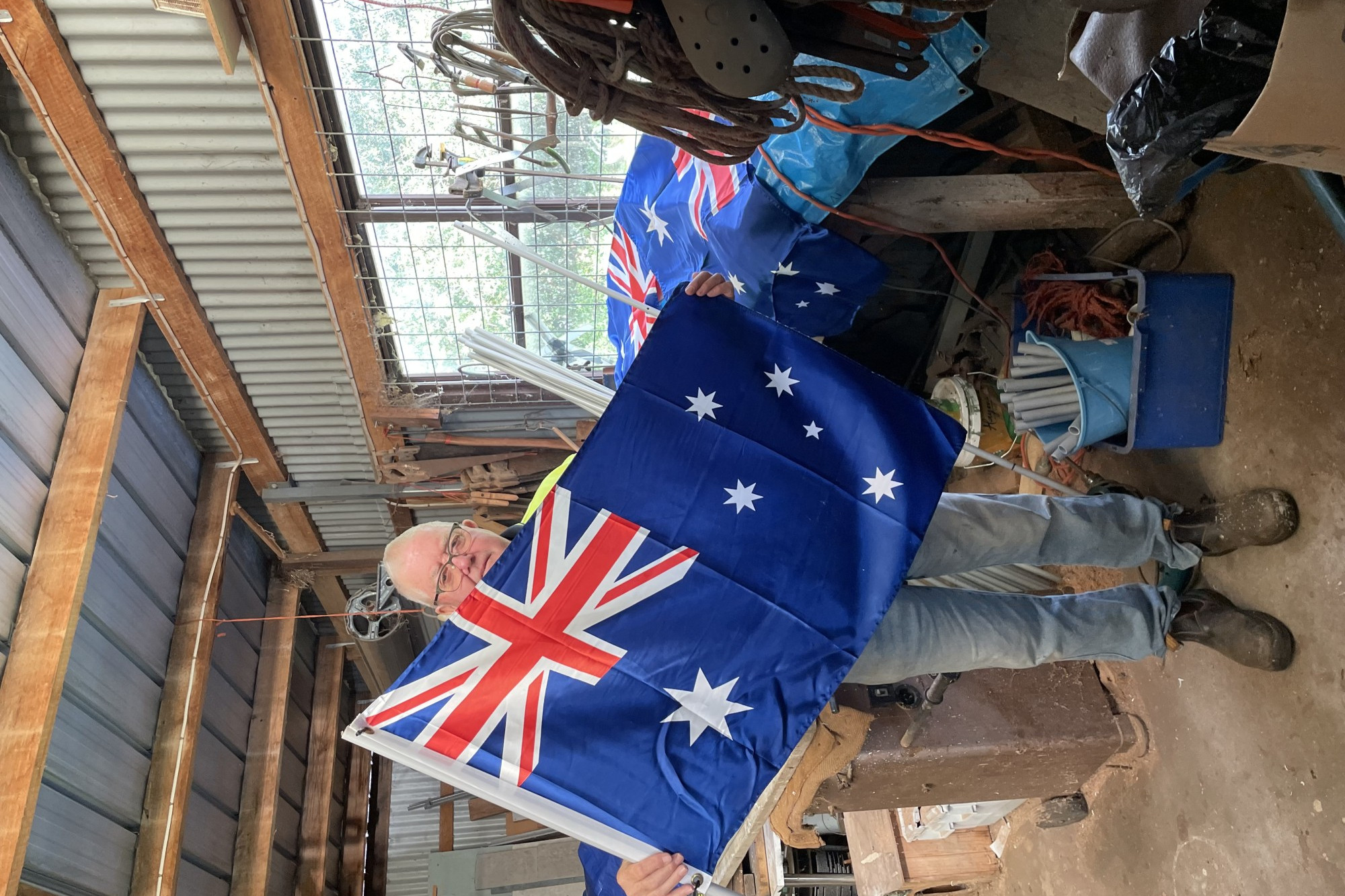 Tradition: Cobden Cemetery Trust member Trevor Roberts is putting together Australian flags which will be placed beside about 70 graves next week