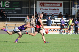 Louis Cahill was dangerous up forward for the Bombers, kicking three goals. 