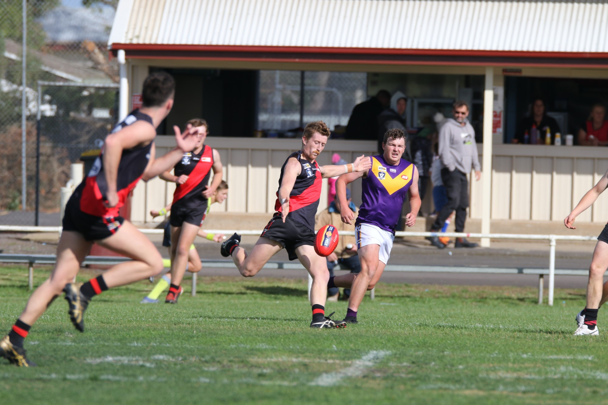 Grady Rooke drives the ball forward in his best on ground performance against Port Fairy.