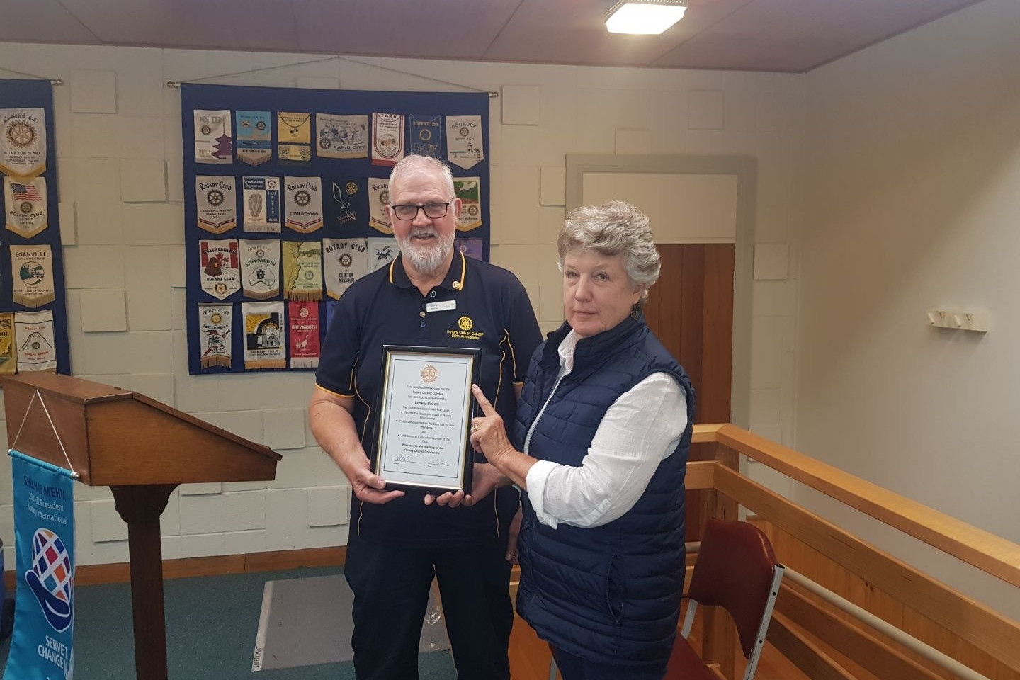 Warm welcome: Cobden Rotary Club of Cobden president Gary Kimber inducts new member Lesley Brown.