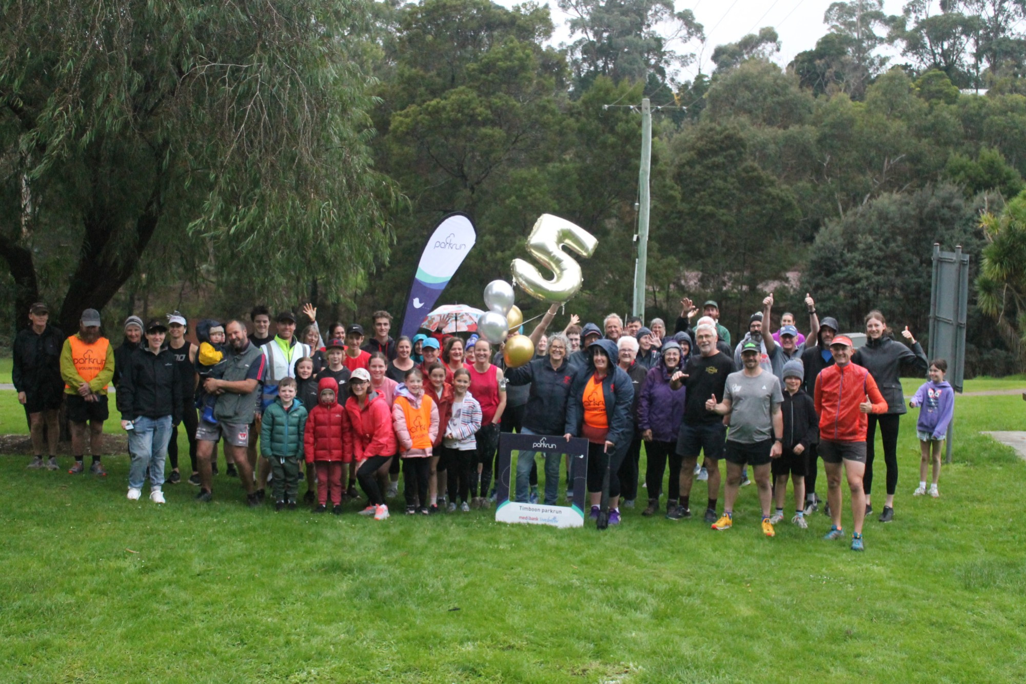 Celebrations: Walkers, runners and volunteers celebrated five years of Timboon parkrun last Saturday.