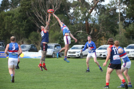 Sam Negrello (Timboon) and Jacob Moloney (Panmure) contest the high ball. 