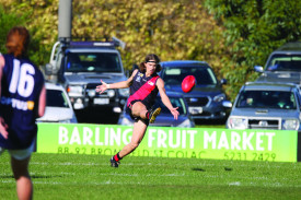 Luke Smith drives the ball forward for Cobden. 