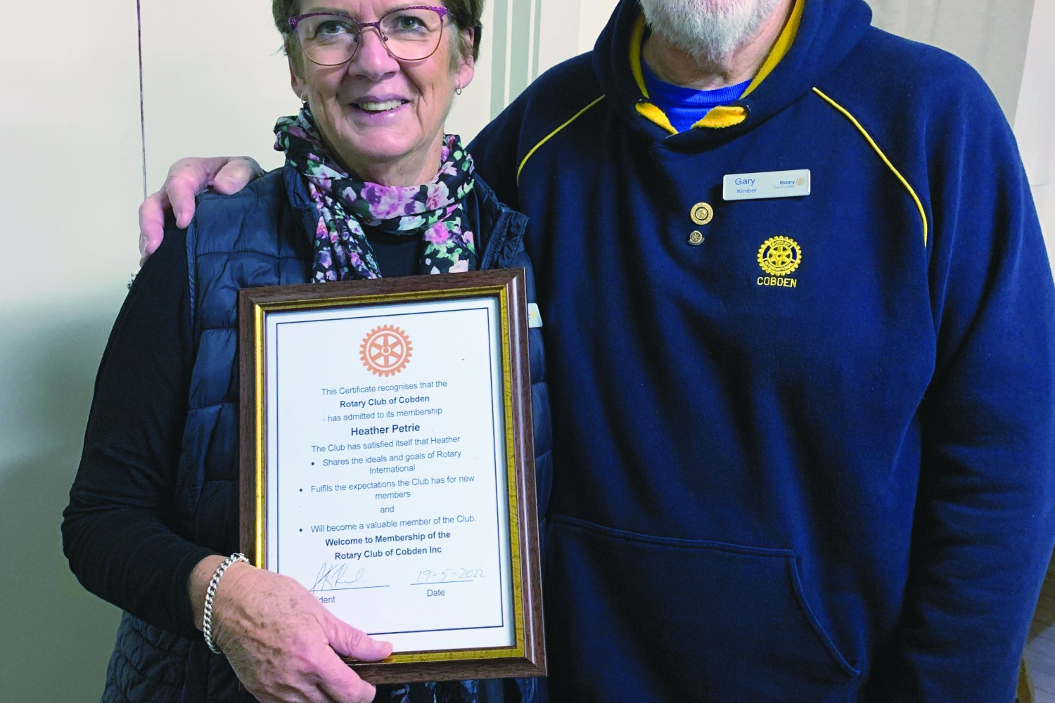 Warm welcome:Cobden Rotary Club’s Gary Kimber inducts new member Heather Petrie.