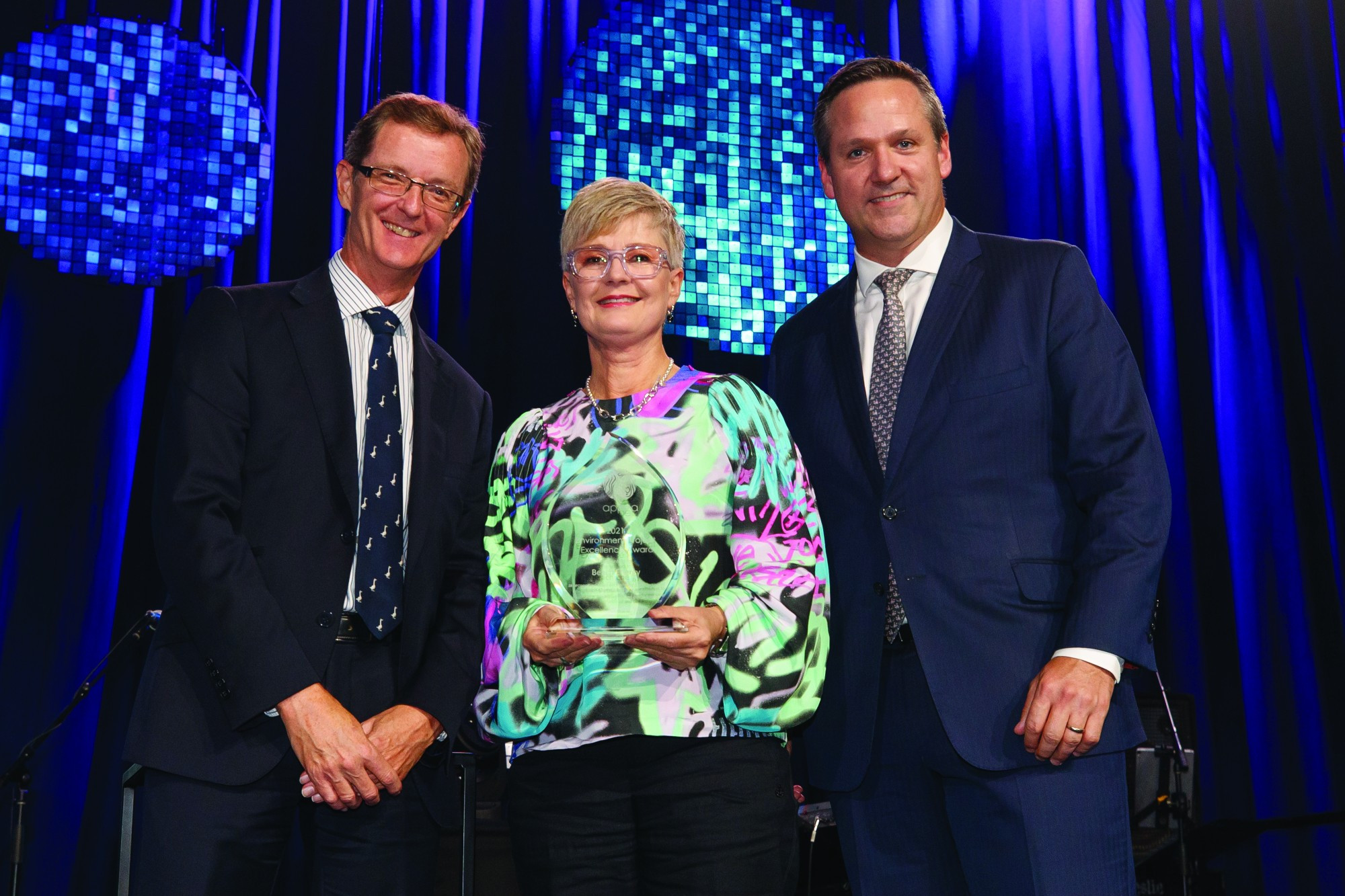 Awarded in excellence: NOPSEMA chief executive officer Stuart Smith (left), Beach Energy group manager social performance and community Linda French and APPEA chair Ian Davies.