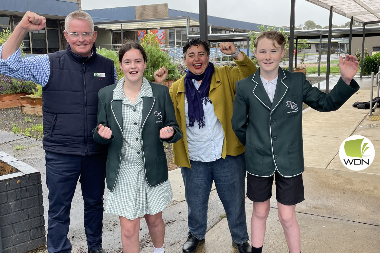Funding commitment: Cobden Technical School principal Rohan Keert with students Olivia Benson and Zac Stevens are overjoyed with a funding pledge from Labor candidate for Polwarth Hutch Hussein.