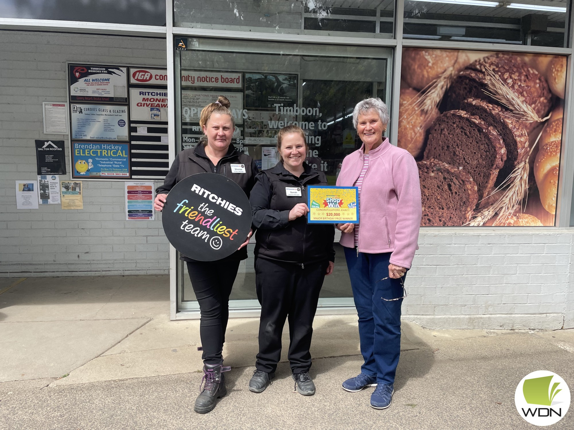 Wow: Ritchies IGA Timboon’s Sarah Pender with major prize winner Jean Clover.