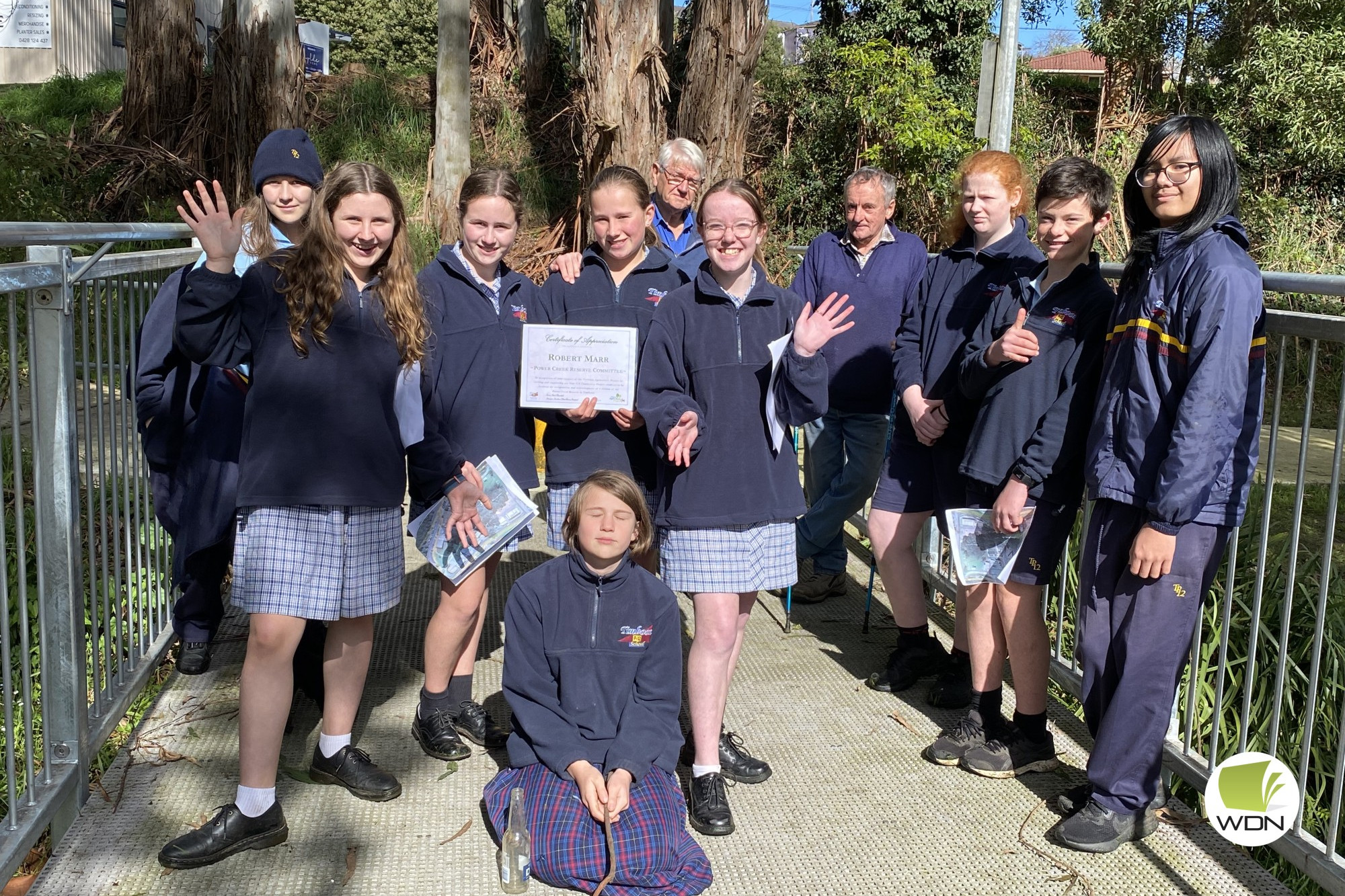Working together: A group of Timboon P-12 School students are joining forces with the Power Creek Reserve Committee.