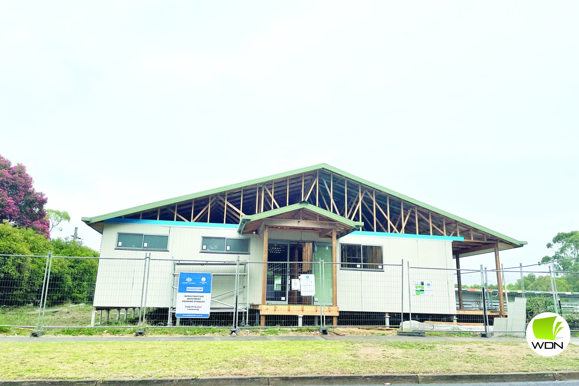Delays: Simpson Bowling Club (pictured during construction earlier this year) had to wait three months for roof trusses then had to accommodate the workloads of local contractors. It is only one example of the projects delayed by supply issues dogging the construction industry.