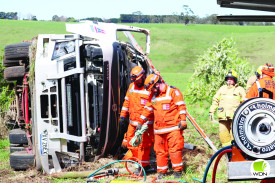 Vital support: Emergency services attended the scene to free the male driver from the tanker.