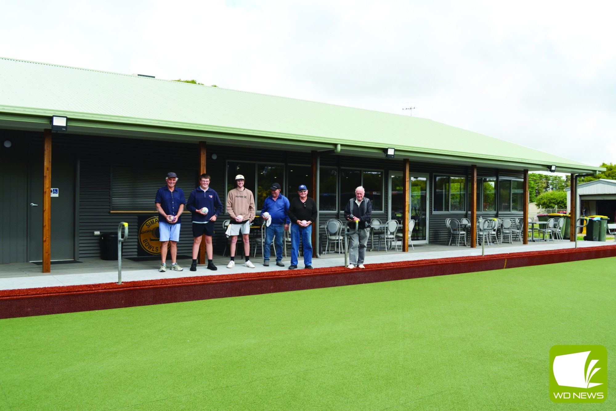 Works done: Bowlers Gary Langenhuizen, Noah Clark, Cody Harris, Joe Sueren and Merv Gass outside the new clubhouse at Simpson.