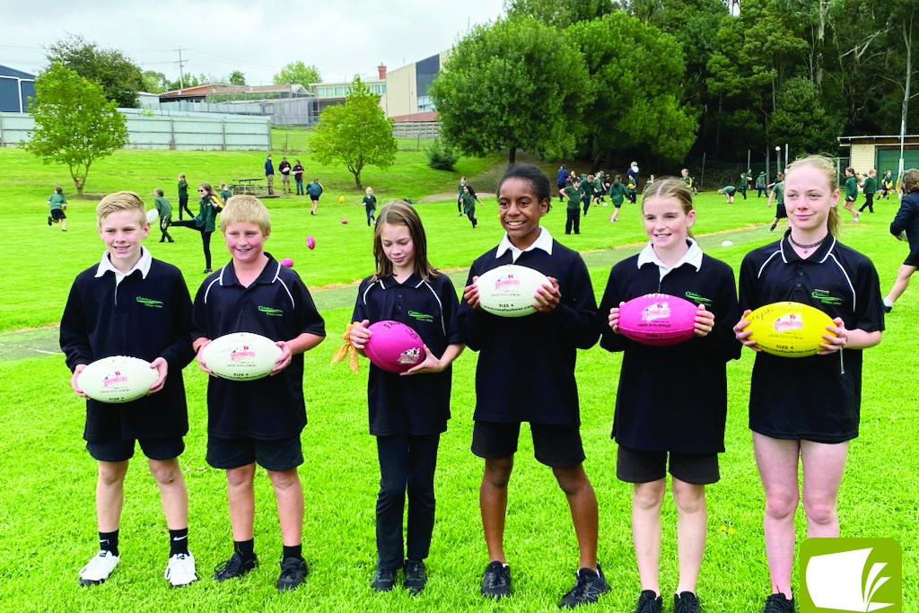 Cobden Primary School students with their new footballs.