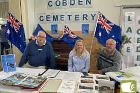 The Cobden Cemetery Trust’s Trevor Roberts (left), Jo Beard and Neville Robertson brought lots of historical records with them. 