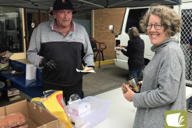 Ron Greagen was on hand to provide Landcare volunteer Anita Chivell with a tasty barbecued sausage. 