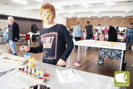 Caleb, 8, showed off his plaster painting on the day. 
