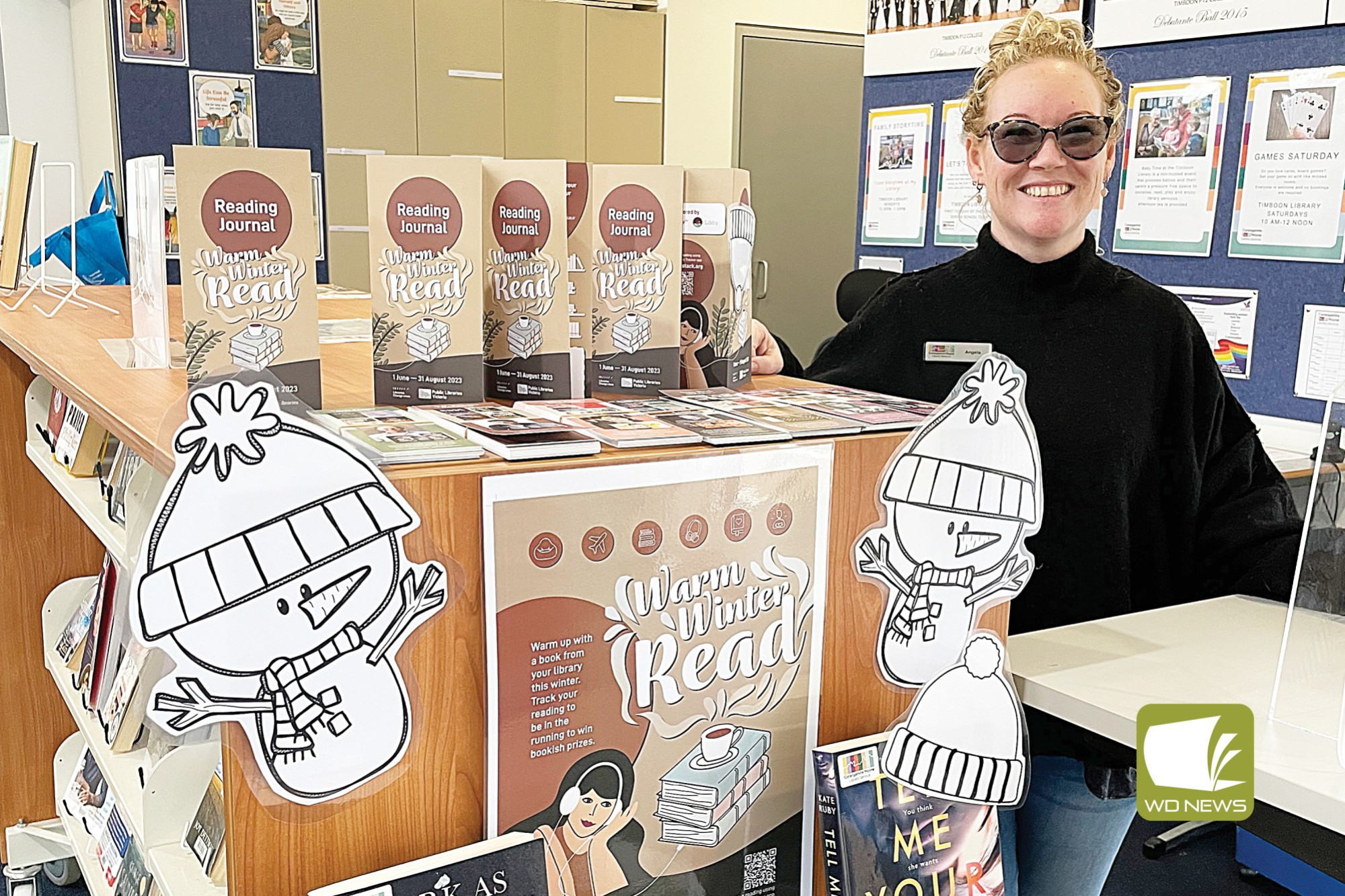 Reading is fun: Timboon librarian Angela Beveridge is encouraging the community to take part in The Warm Winter Reads program.