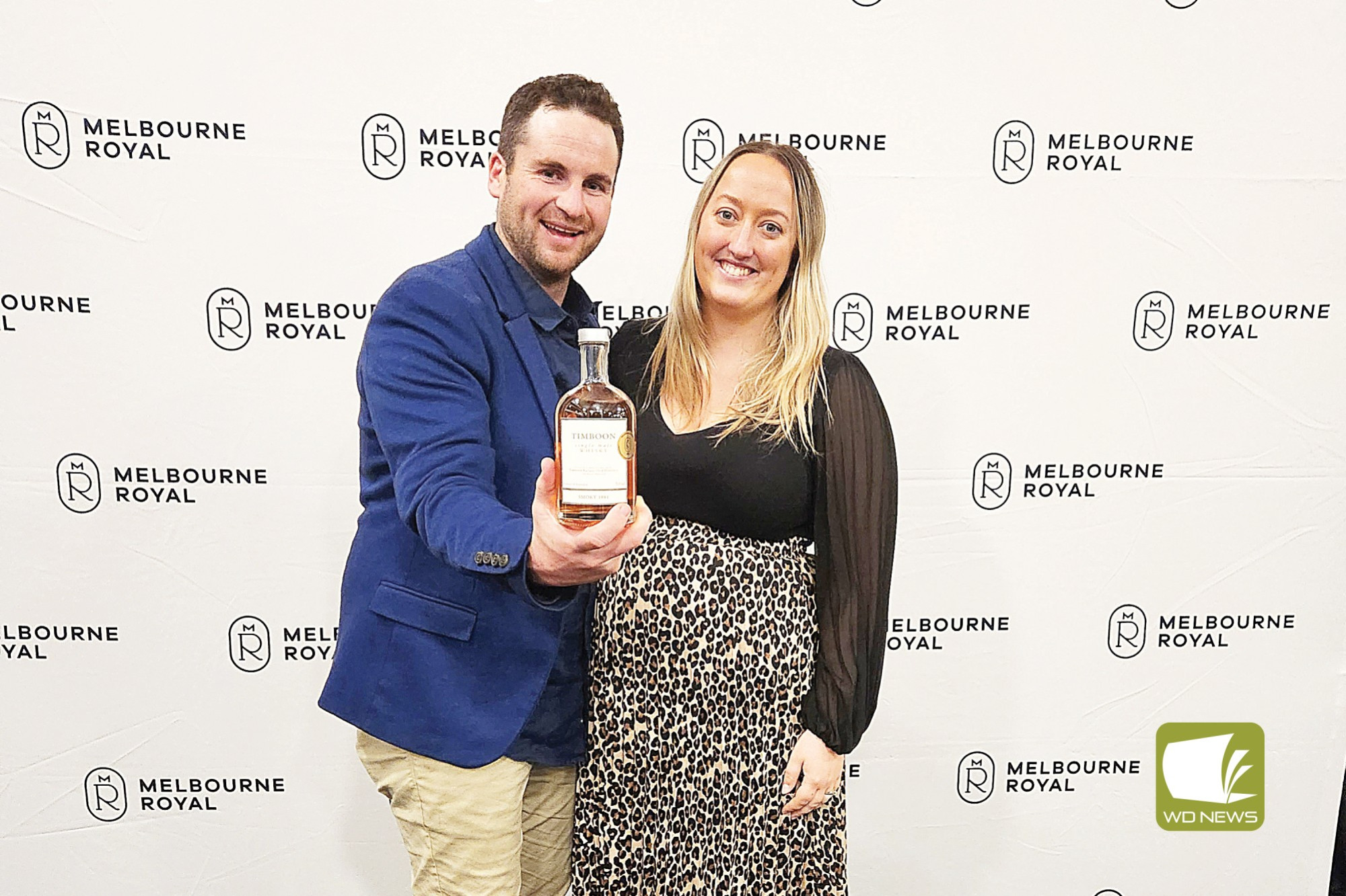 Congratulations: Timboon Railway Shed Distillery head distiller Josh Walker, with wife Caitlin, celebrate their Timboon Single Malt Wisky – Smoky 1881 taking out a gold award.