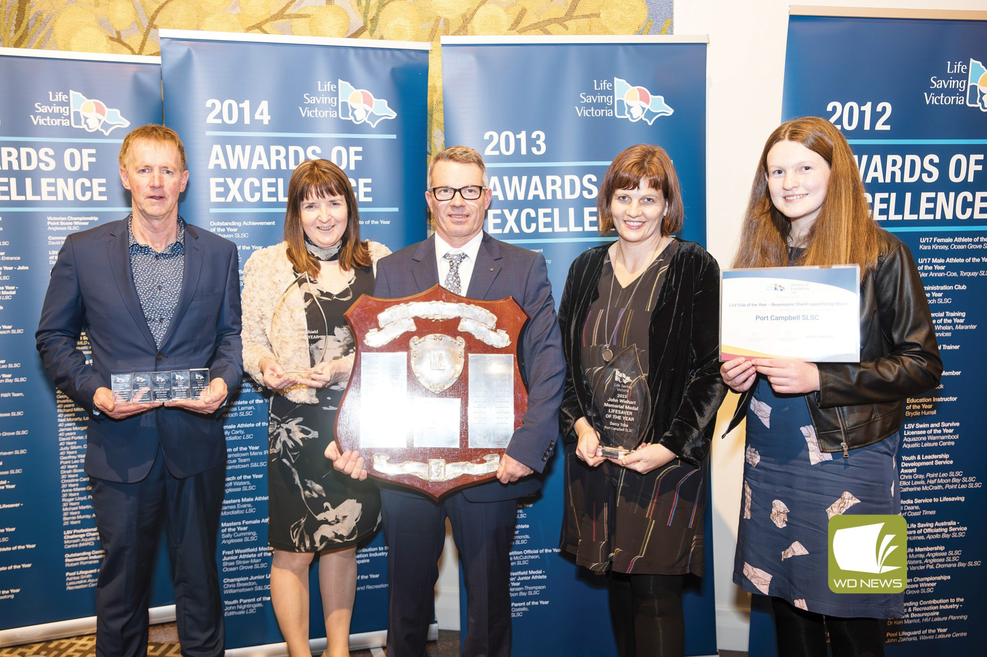 Congratulations: Port Campbell Surf Life Saving Club members Gary Askew, Coralee Askew, Scott McKenzie, Rebecca McAuliffe and Claire McAulliffe attended what was a successful night for the club at the Life Saving Victoria (LSV) Awards of Excellence.