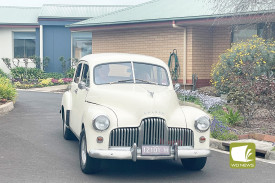An old FJ Holden was one of the six cars. 