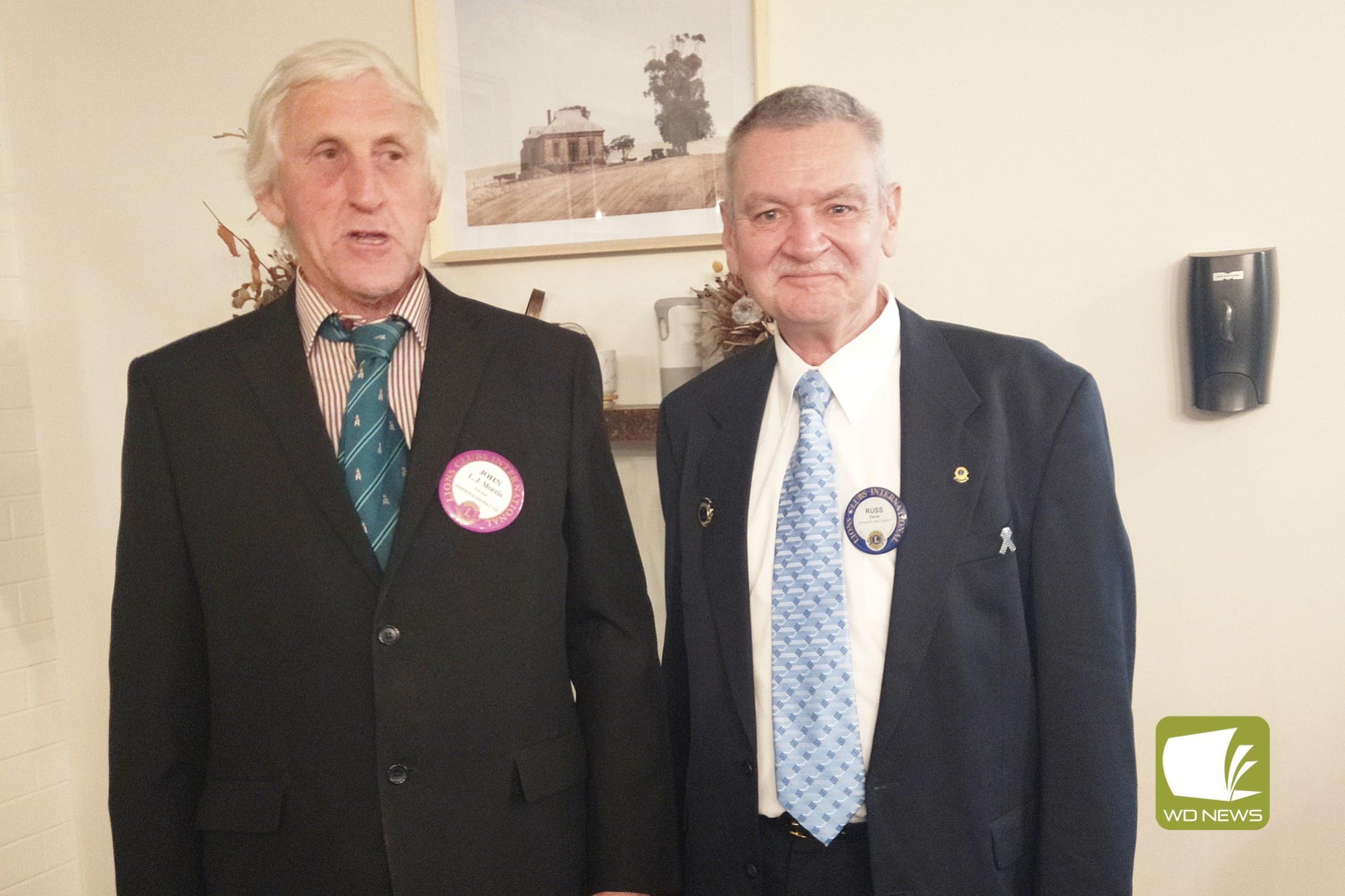 Changeover: Simpson and District Lions Club past president John Morris with new president Russ Davis.