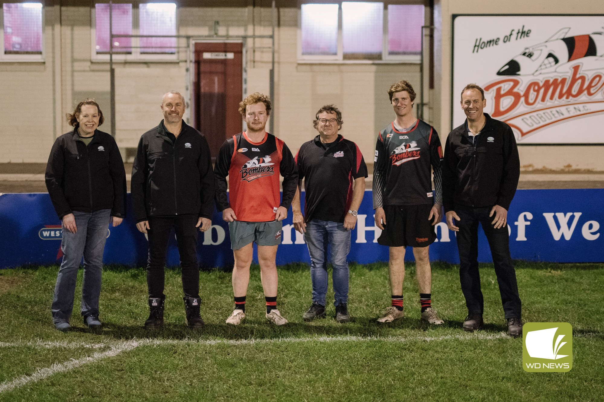 Lynda Whitehead, Bret Unwin, Paul Pekin, James Green, Jack Hutt and Andrew Westlake at the home of the Bombers.