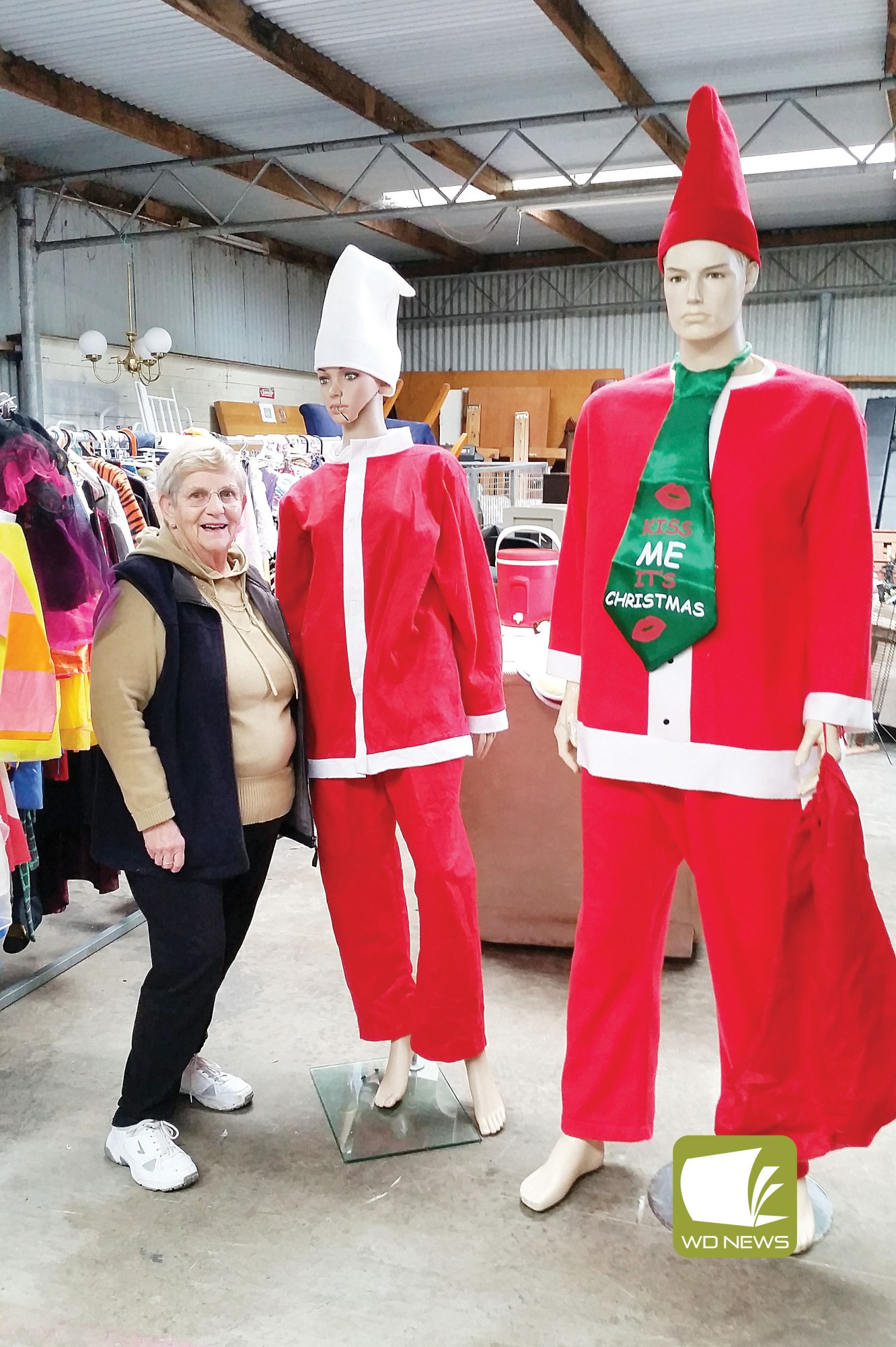 Celelbration: TOPS co-ordinator Brenda Parfett said the shop is marking Christmas in July this year and the shop’s mannequins have been dressed up.