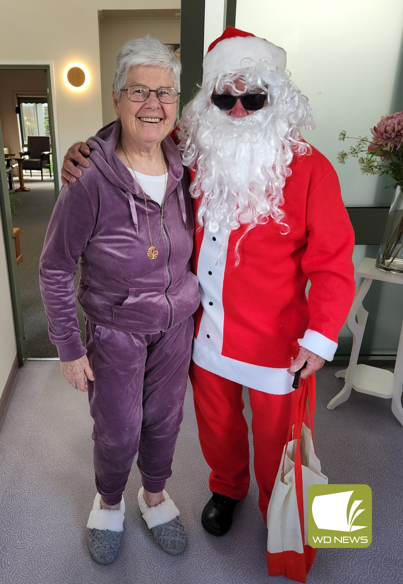 Shirley Rohan with Santa at Cobdenhealth’s Christmas in July celebrations last week. .