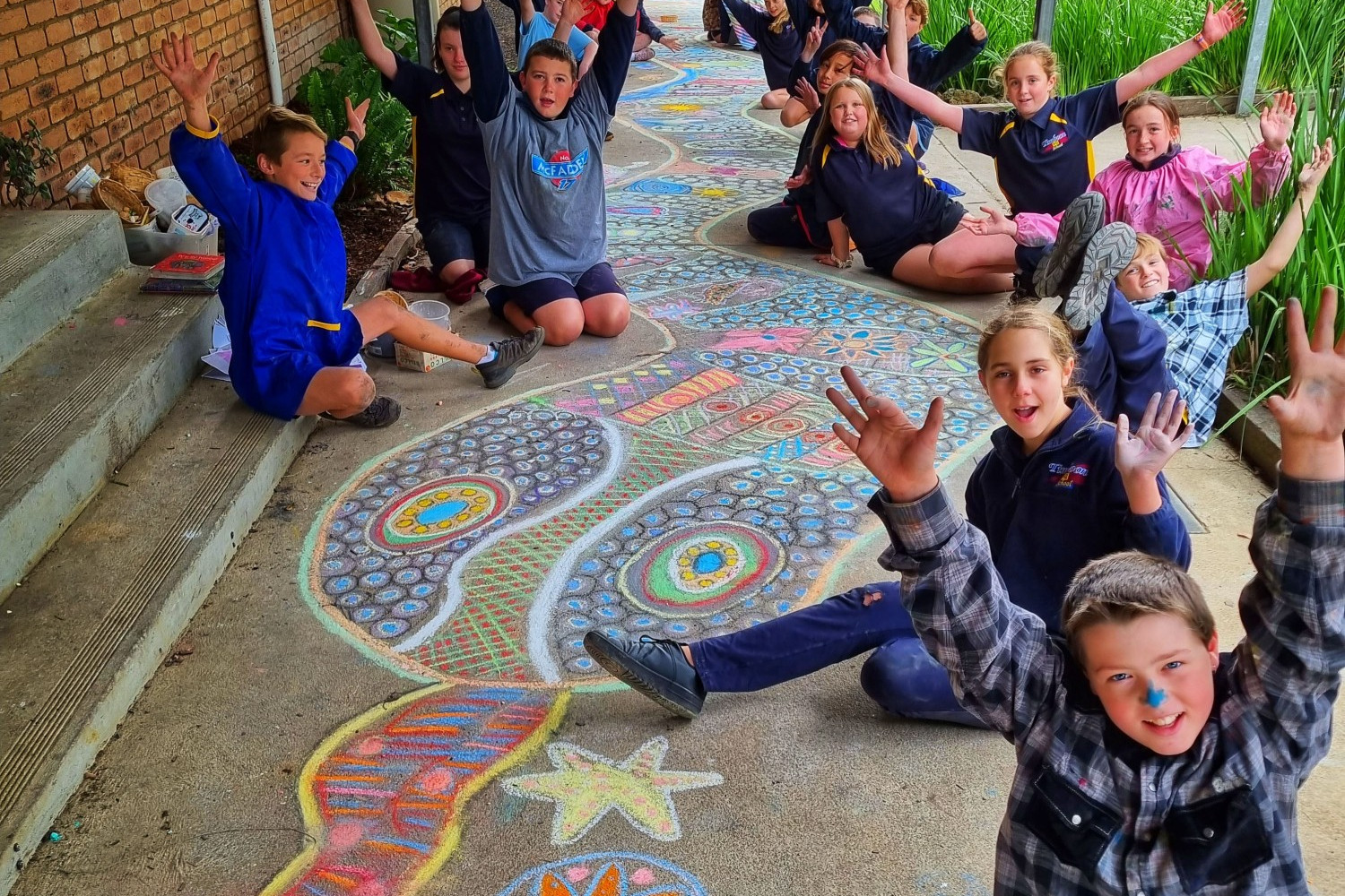 Learning experience: Timboon P-12 School students helped create a rainbow serpent at the school recently.