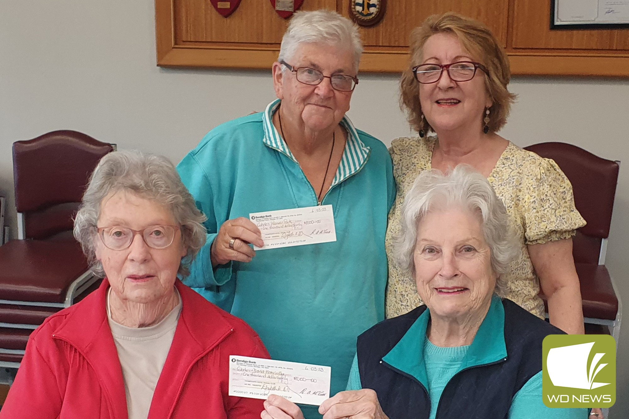 Support appreciated: Thommos Hotel Social Club secretary/treasurer Betty McCormack (back right) presents Cobden Pioneer Park’s Heather Walsh (back left) and Cobden and District Historical Society members Jennifer Kripp (front left) and Judith Gribble (front right) with cheques for $1000.