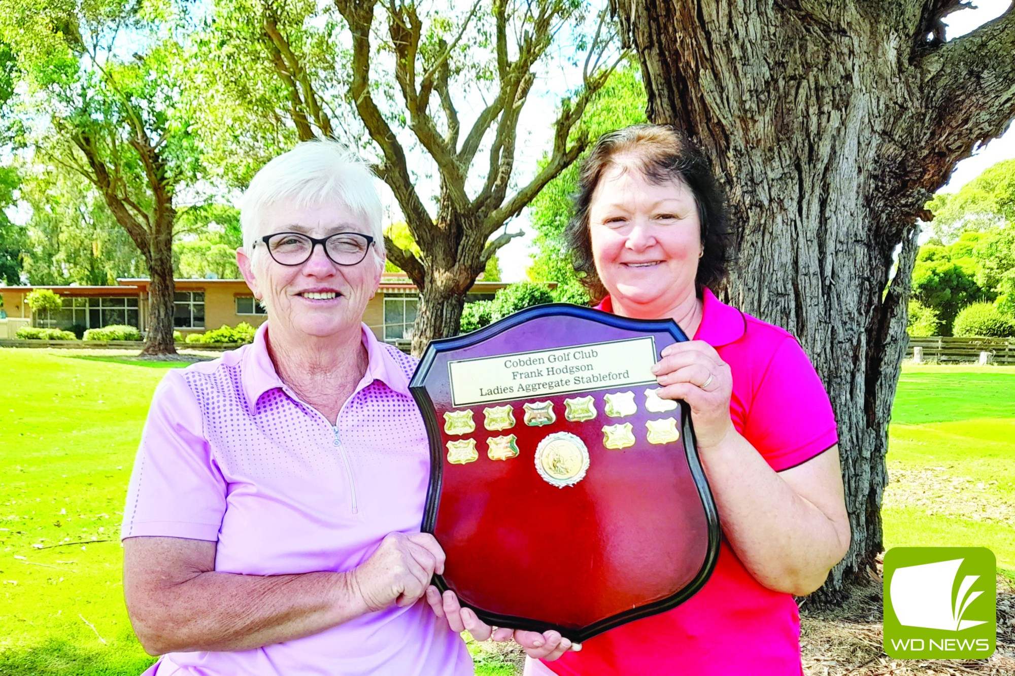 Pat Tickner (left) and Jo Hintum celebrate their win in the Frank Hodgson Pairs event.