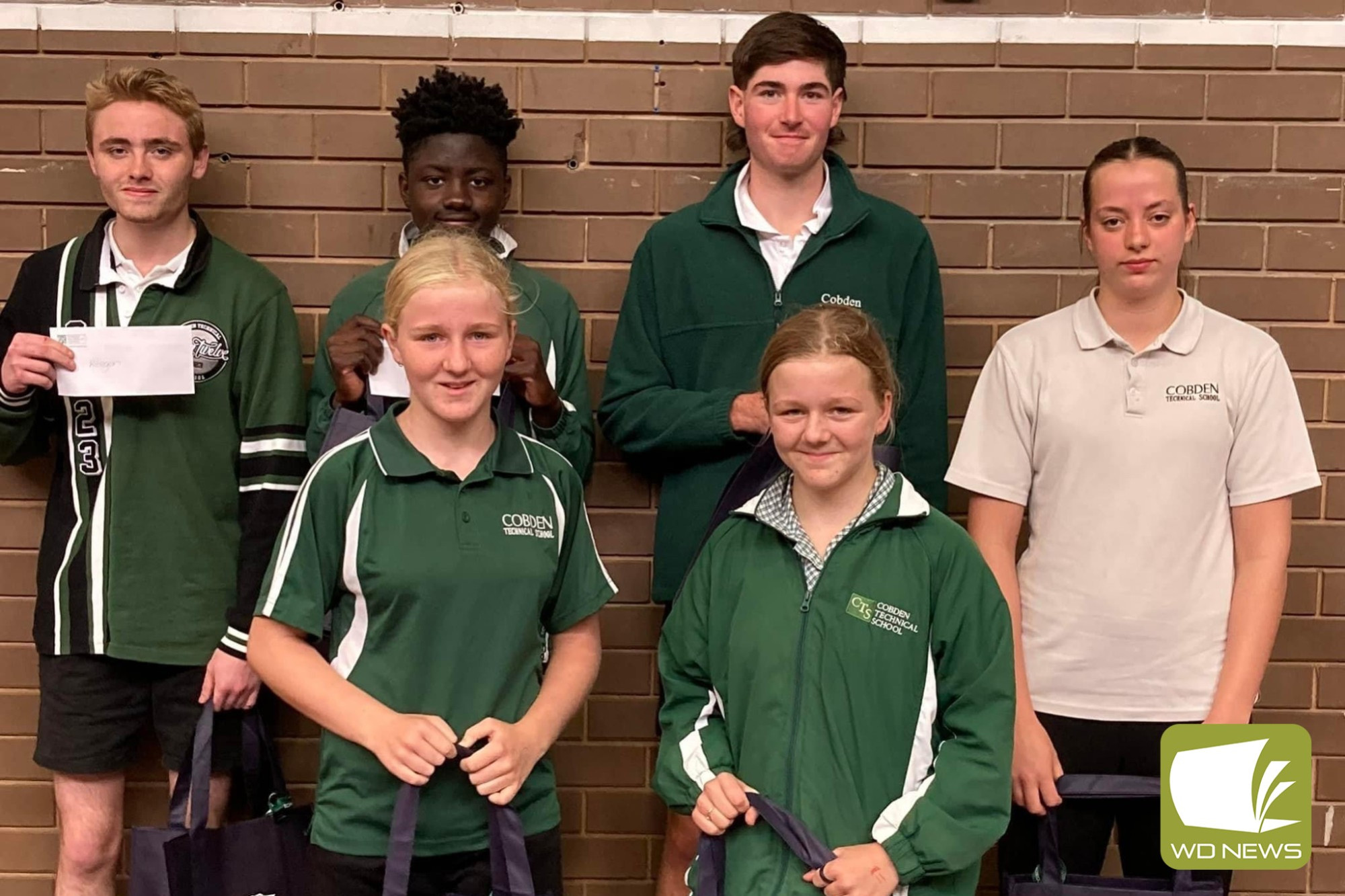 Keegan Brandrup (third male runner), Felix NguenaNguena (second male runner), Brodie Foster (fastest male and first runner home), Tabitha Perriss (third female runner) and, in front, Taliyah Bishop (1st) and Akeisha Bishop (2nd).