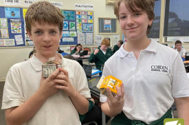 Bayley Roach and Enya Cole were happy to receive free milk. 