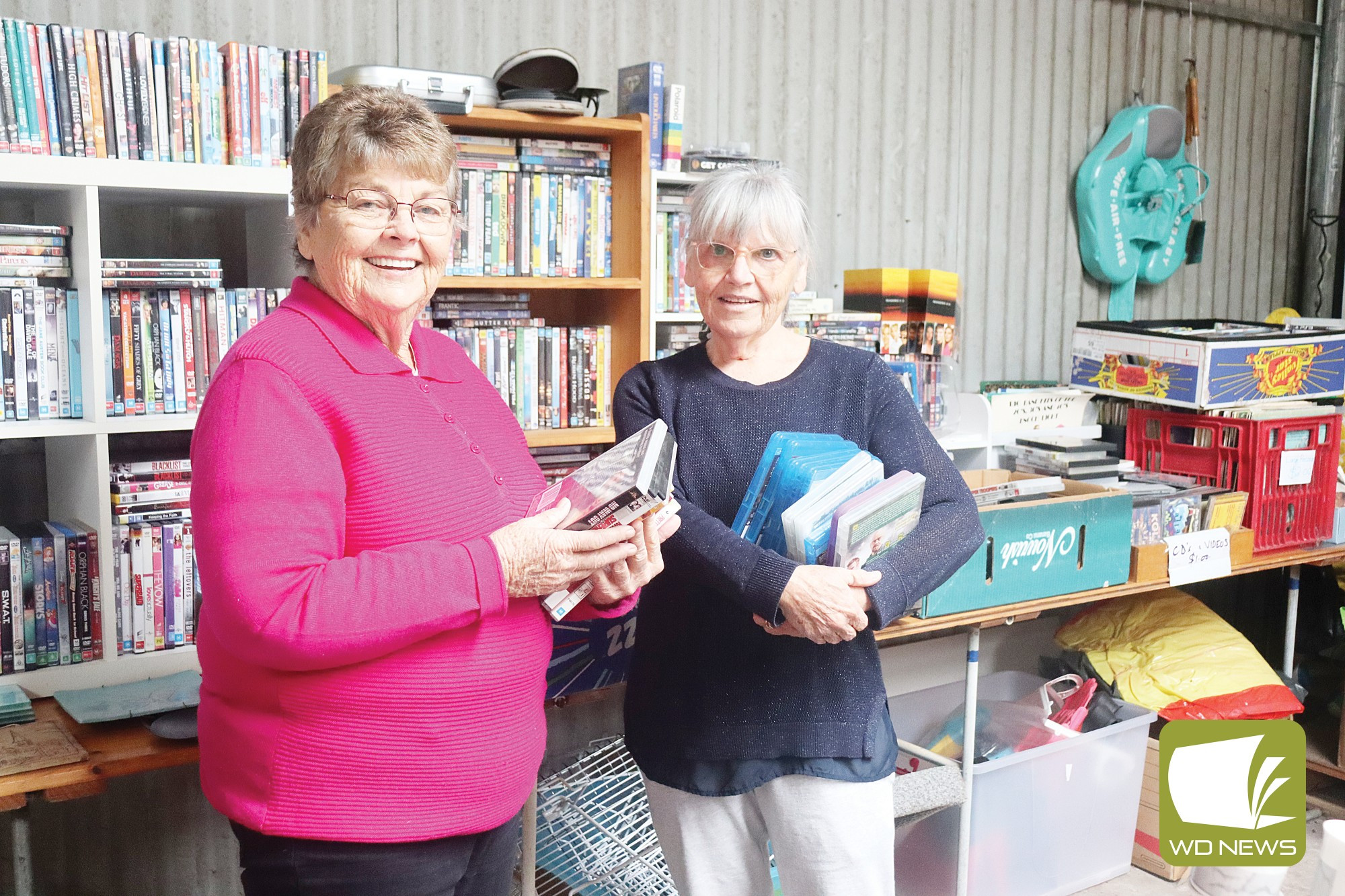 Supporting the community: TOPS volunteer Jan Hutchinson welcomes new volunteer Glyn Scott to the shop.