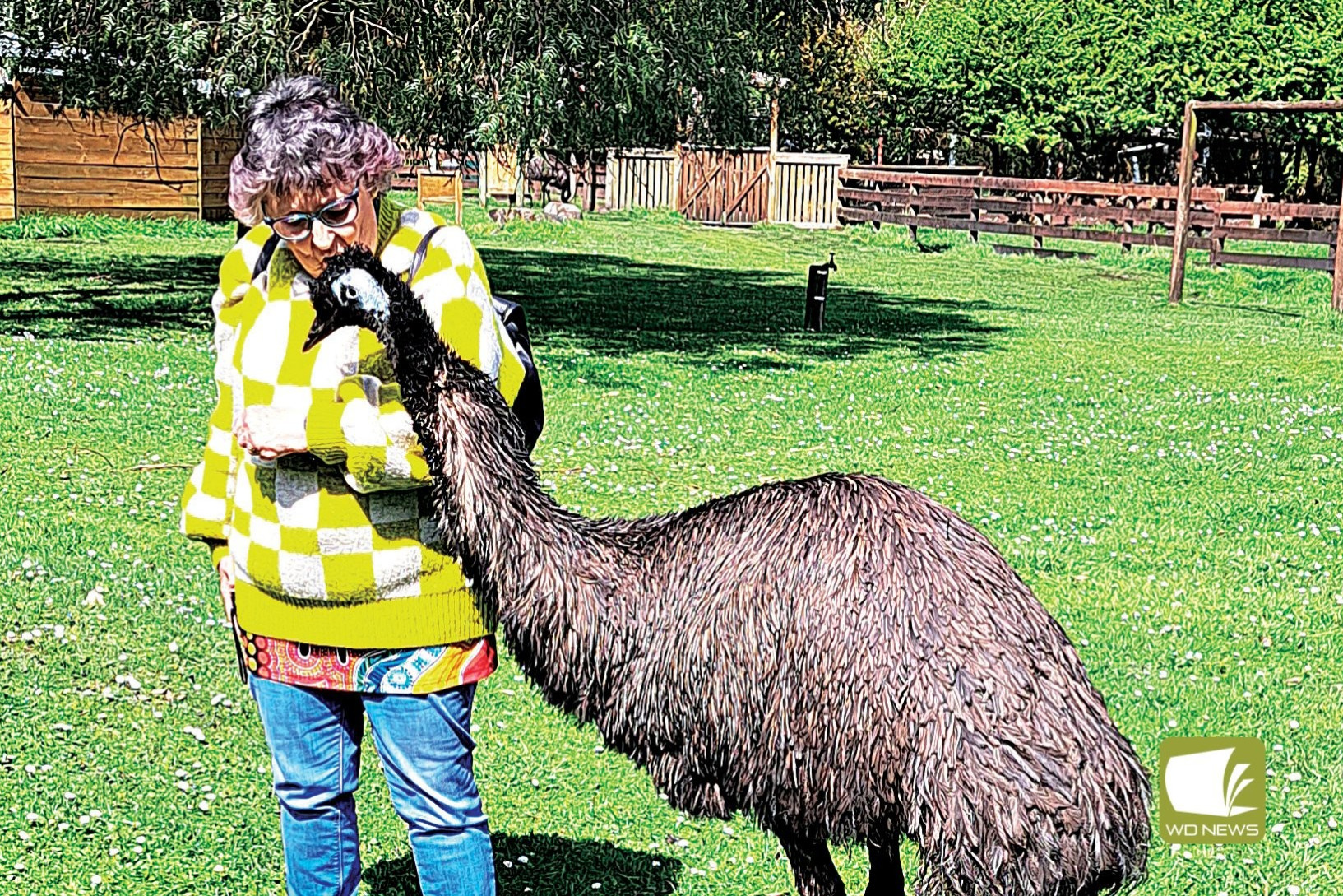 Timboon Probus Club member Sue McInnes gets a closer look at an emu during a club outing to the Great Ocean Road Wildlife Park.