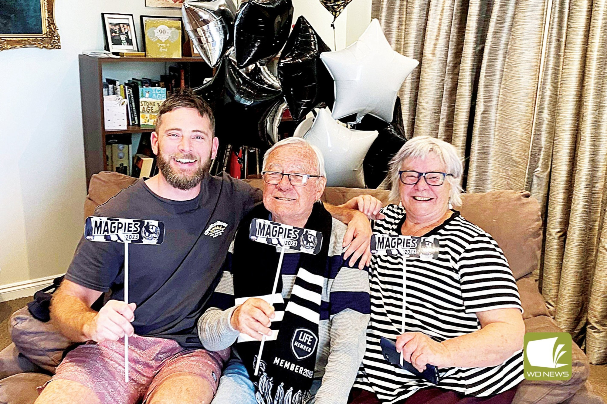 Cobden export and Collingwood premiership winner Thorold Merrett celebrated his 90th birthday on Saturday, pictured with grandson James De Neefe and daughter Jennie De Neefe.