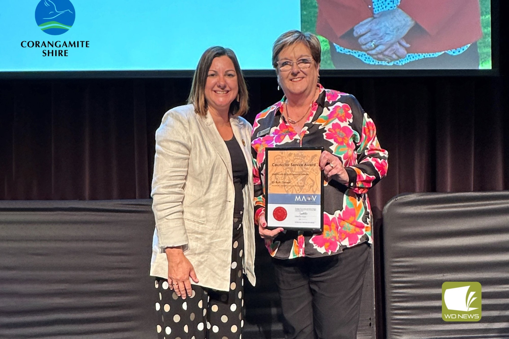 Congratulations: Federal Local Government Minister Kristy McBain presents Mayor Ruth Gstrein with her 20-year Councillor Service Award.
