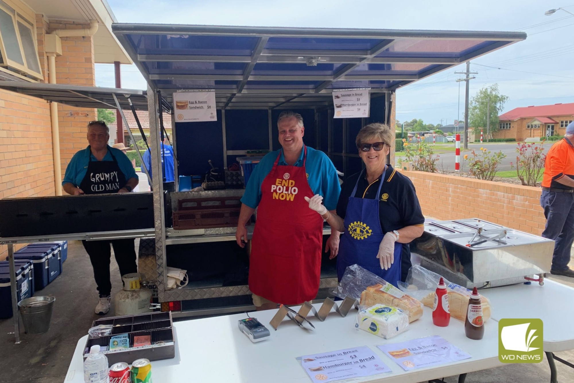 For hire: Cobden Rotary Club members cooked a voters for residents casting their vote in the referendum.