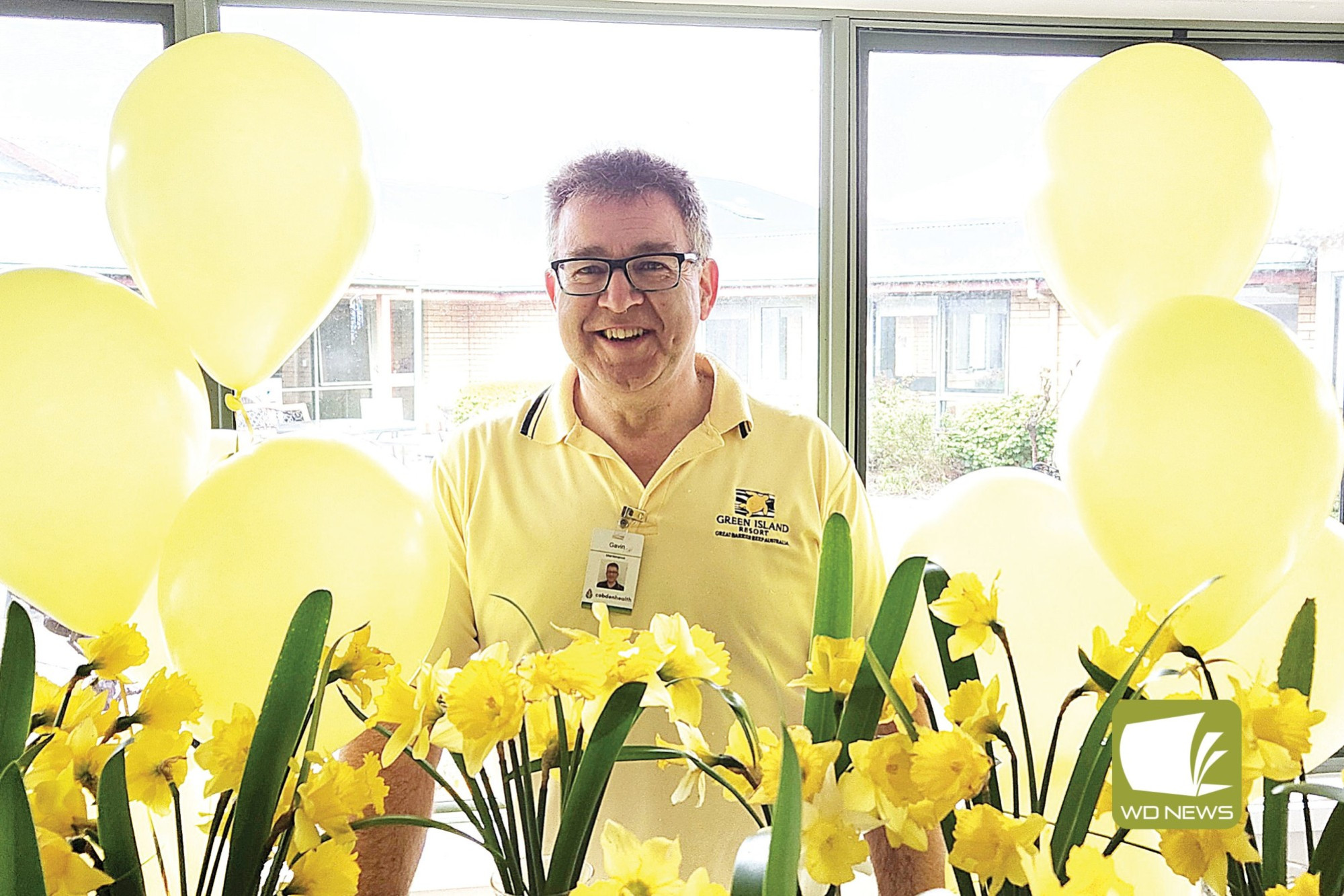 Campaign: Cobdenhealth staff member Gavin Riches dressed in yellow in support of Daffodil Day last Thursday.