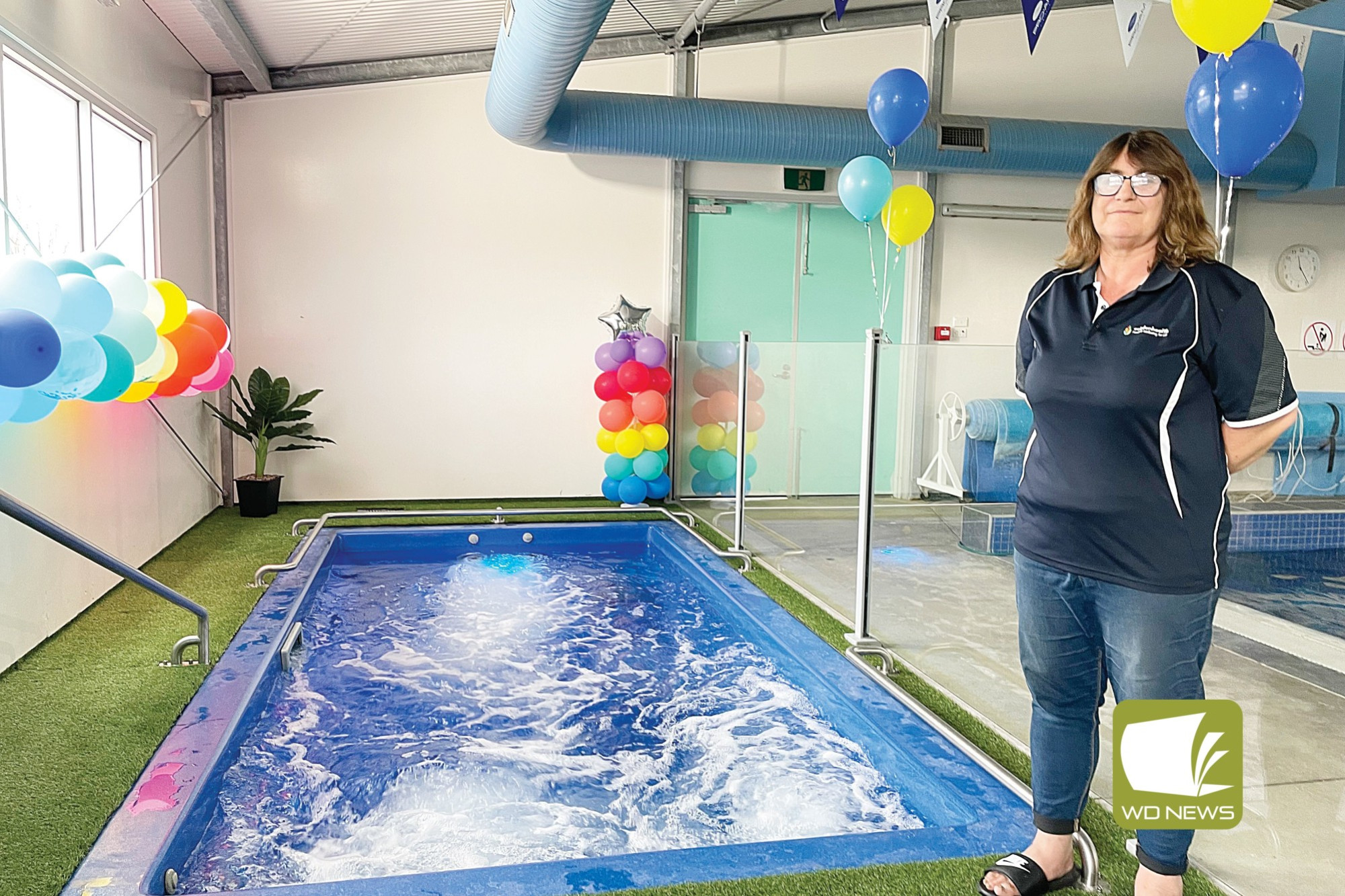 Celebration: Rodney Grove Community Aquatic Centre manager Lee Edge celebrates the reopening of the centre’s swim spa this week.