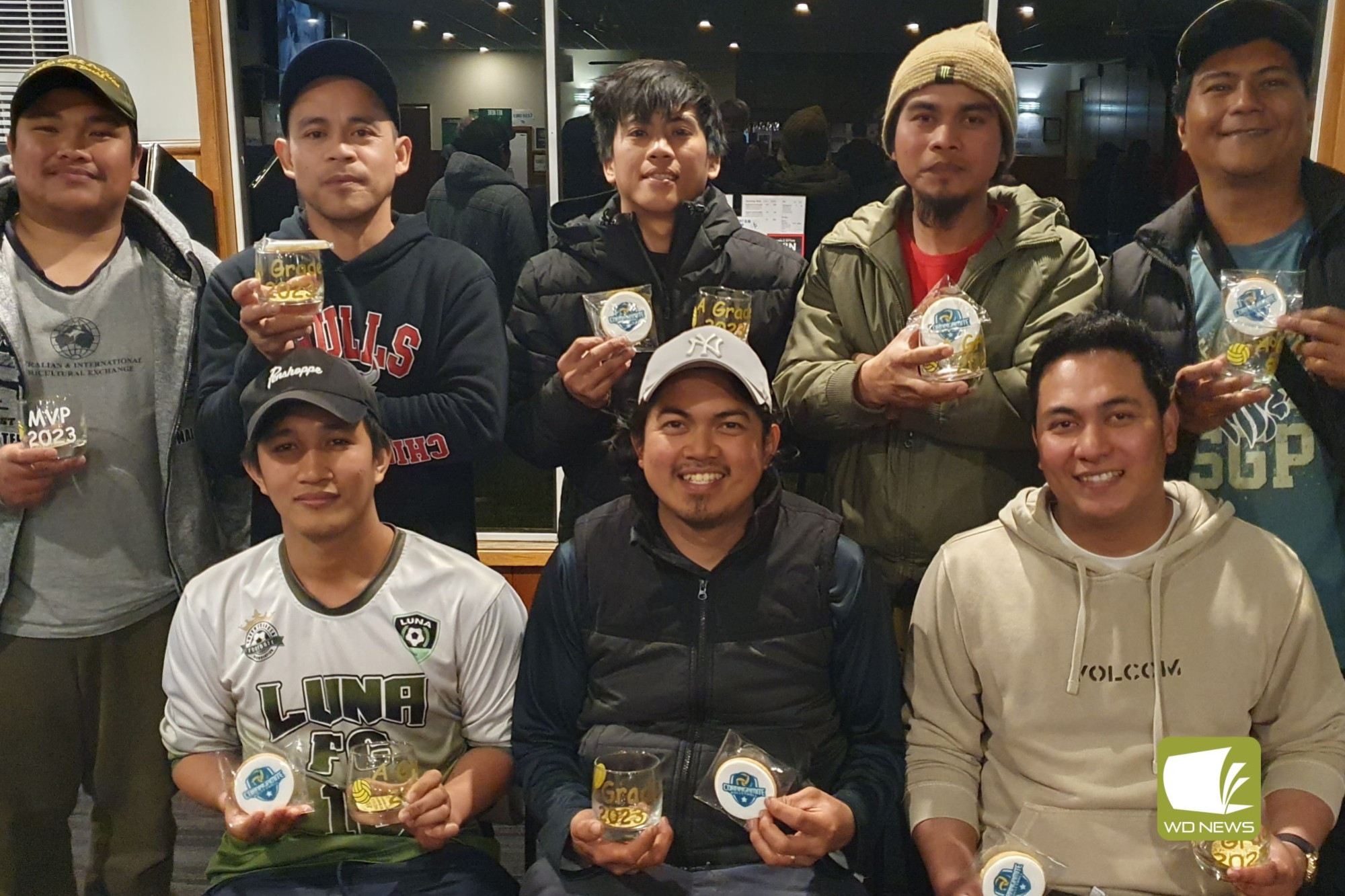 A grade winners, Stallions. Back row: Joel (left), Mario, Renz, Hiubert and Herbert; Front: Nehimiah, Laurence and Christian.