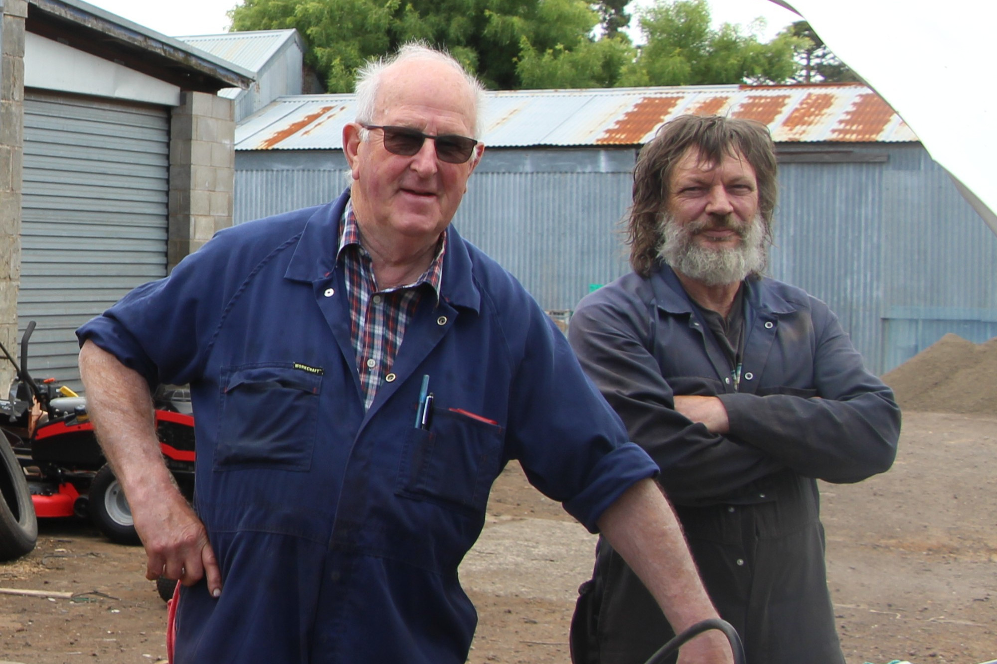 Clocking off: Mortlake mechanic Brian Woolley (left) will retire next month after more than five decades working at the Woolley Motors garage, including 34 years with Kelly Henderson.