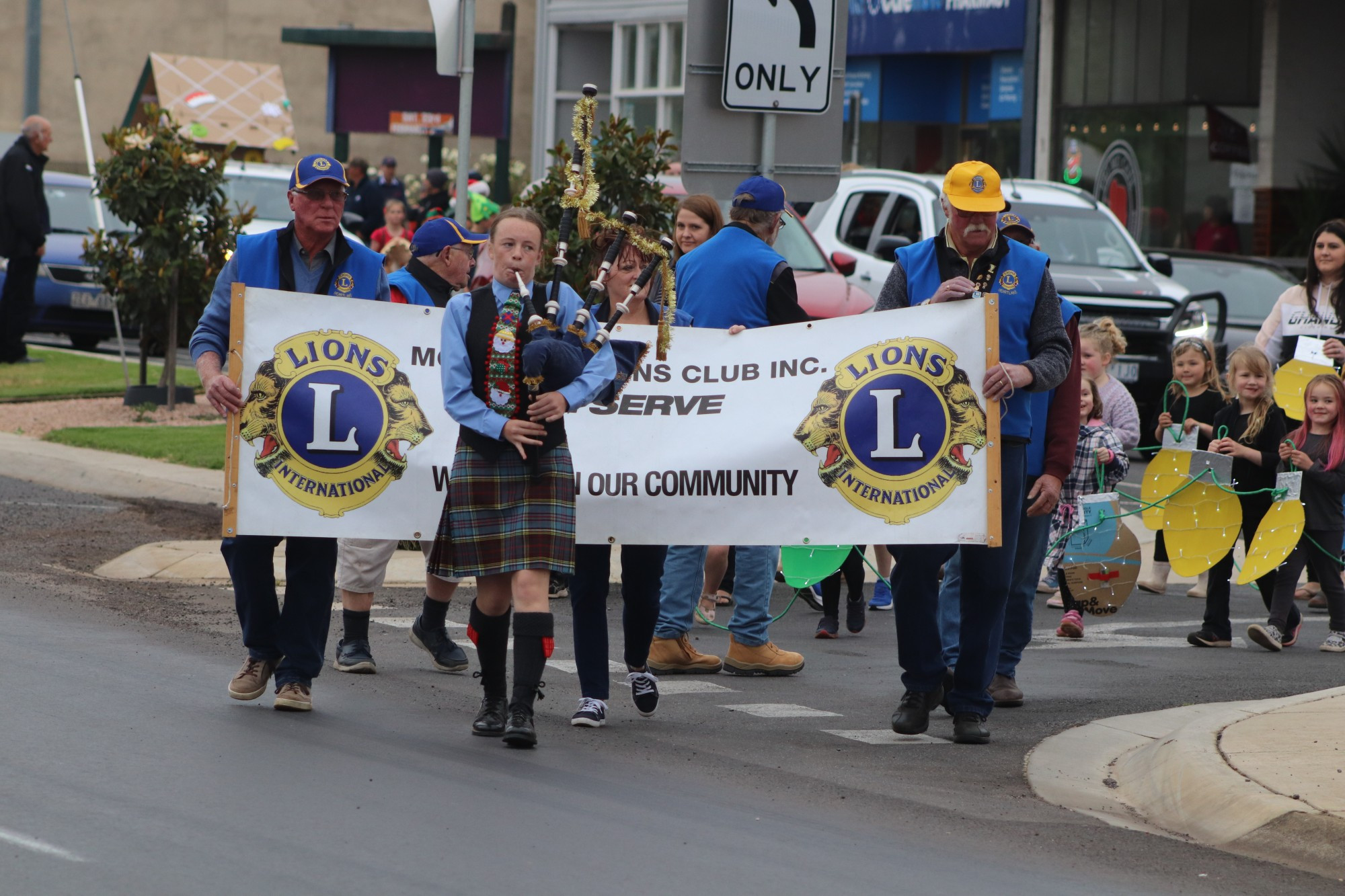 Leader: A bagpiper leads the Mortlake Christmas parade into Market Square last Friday.