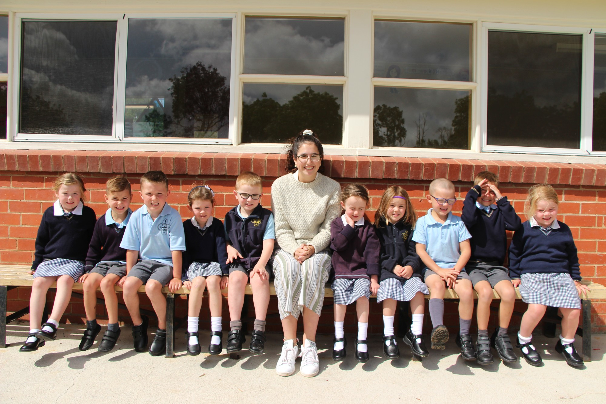 Fresh faces: St Colman’s Primary School welcomed trainee Ebony Poole alongside 10 new Preps on Monday.