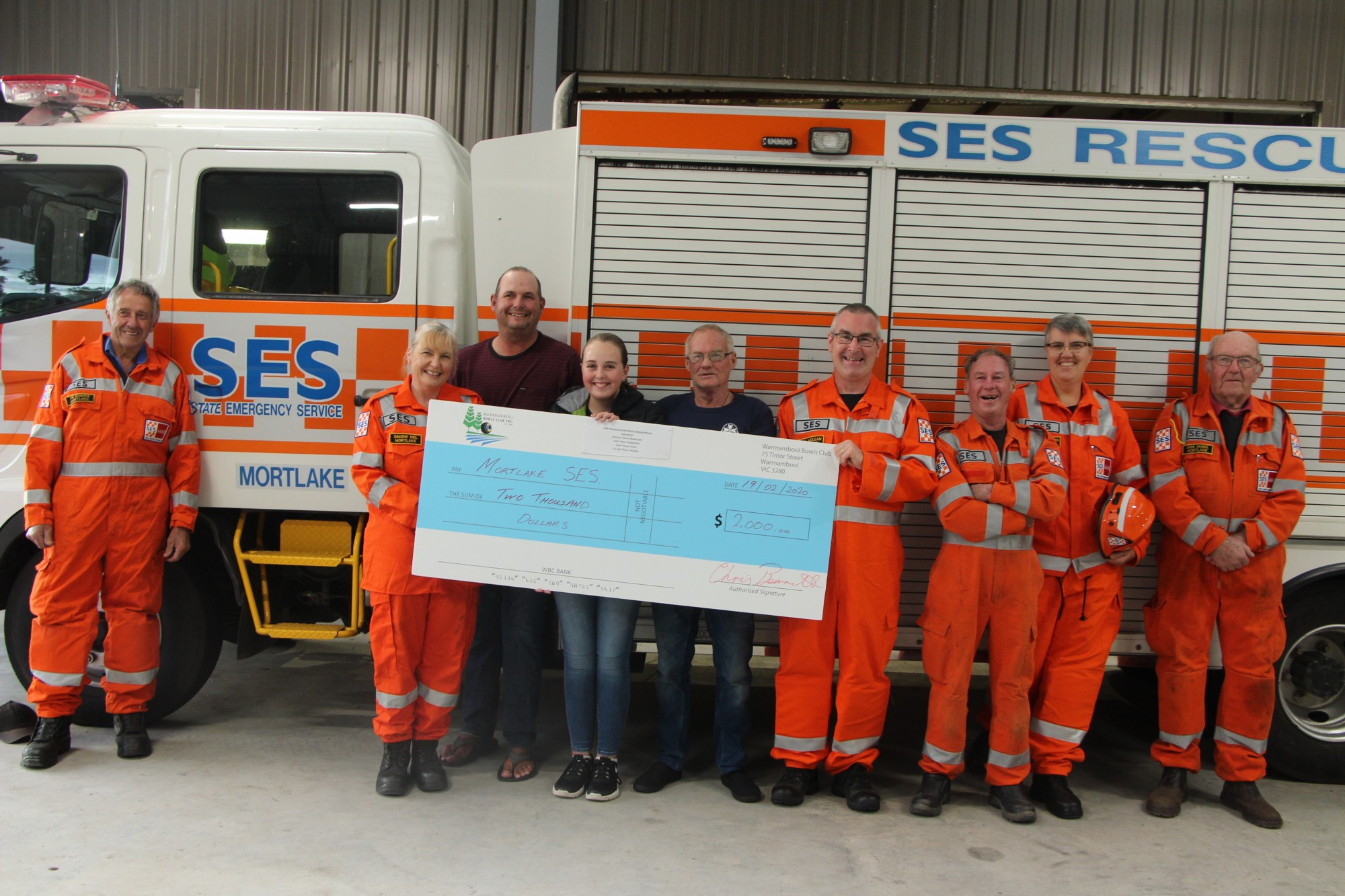 Big win: Members of the Mortlake SES receive a $2000 donation from the Mortlake emergency services winners of the second annual Emergency Services Bowl Challenge.